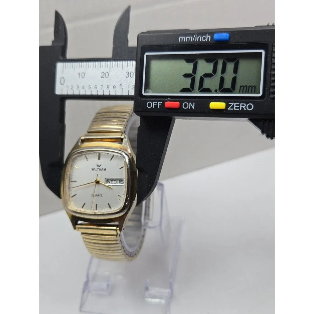 Waltham Vintage Quartz Watch Day Date Gold Tone Square Case Stretch Band